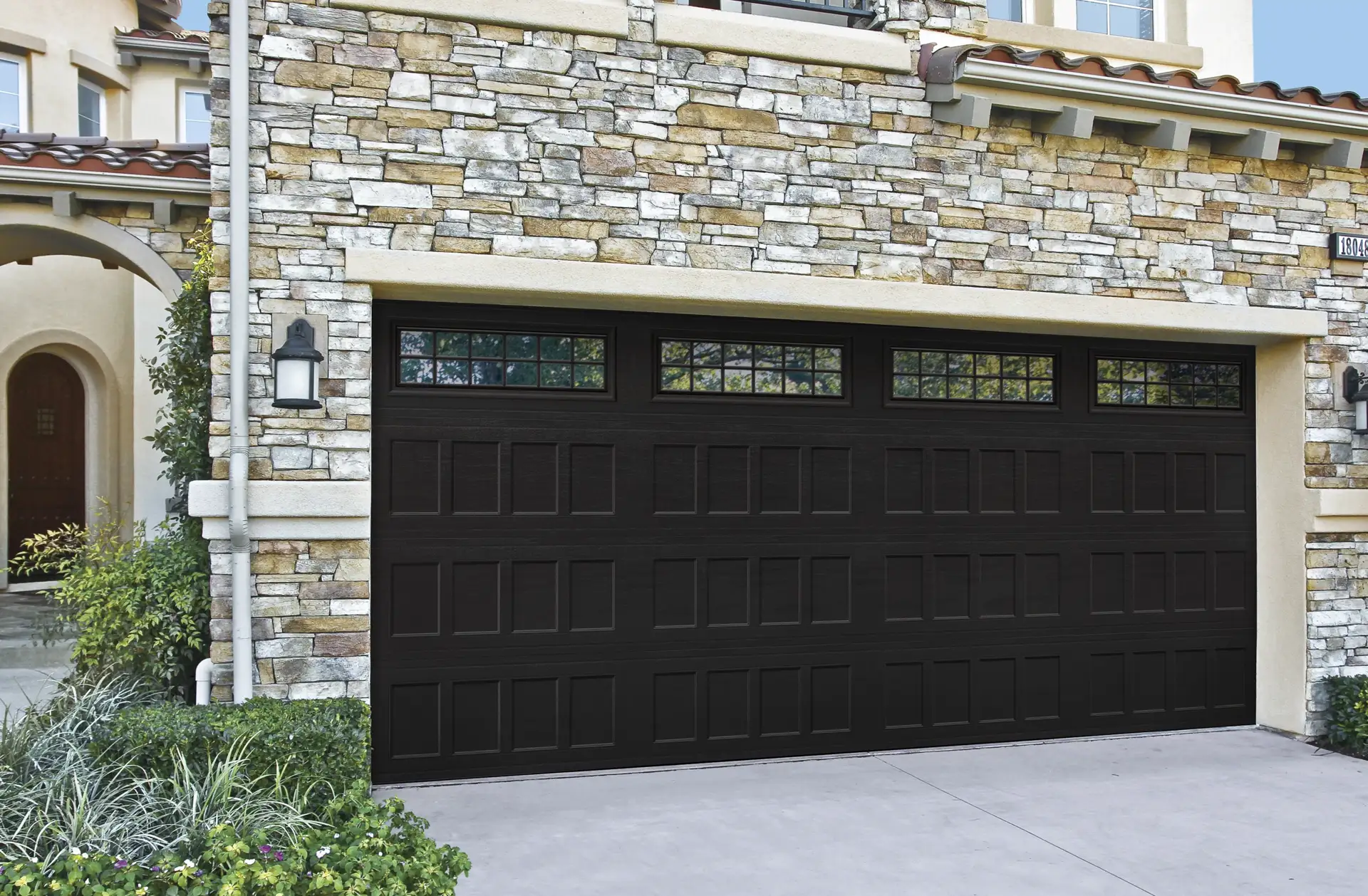 Black glazed garage door with modern opener