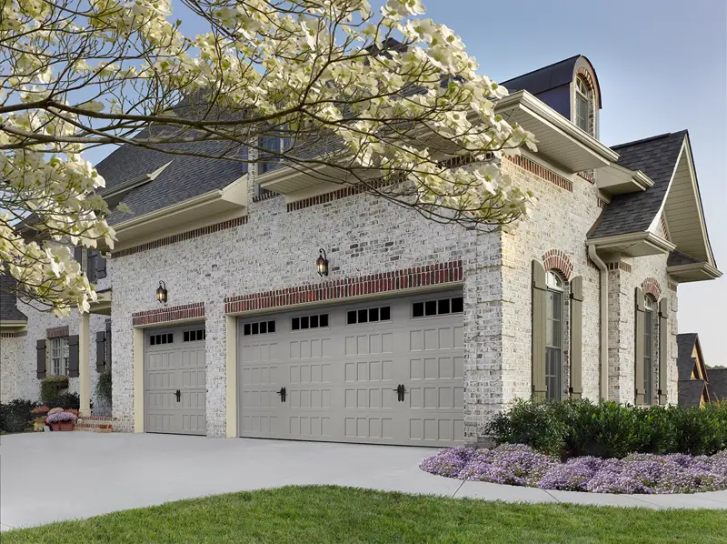 Sandtone recessed glazed steel garage door